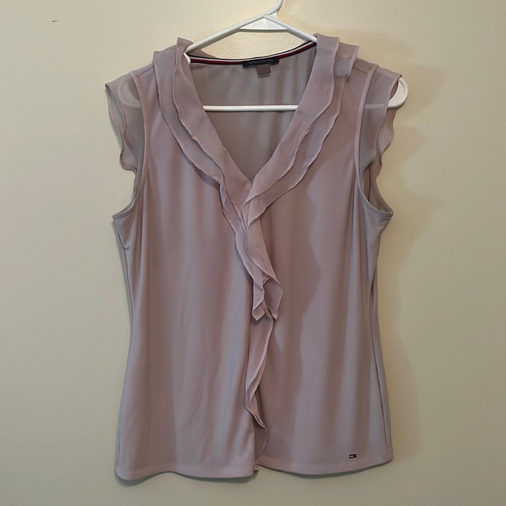 Pink sleeveless blouse